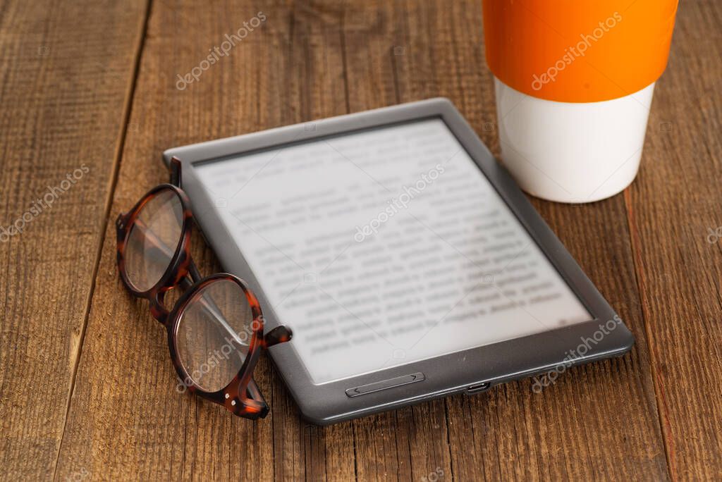 Ebook reader on a tech desk